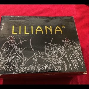 Black and gold Lilias. Never worn.